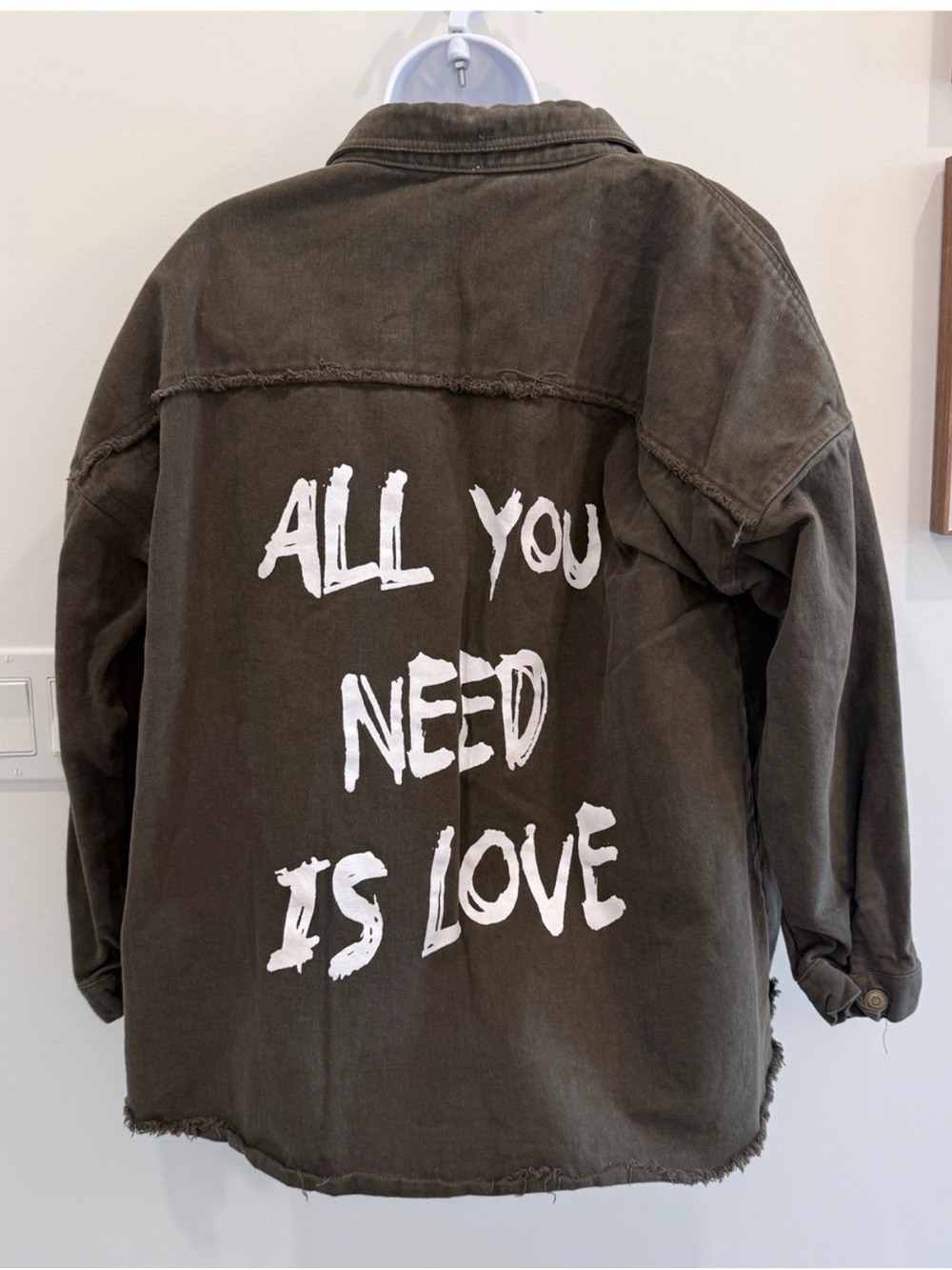 Kori Olive Green Jacket with Red Nail Accent